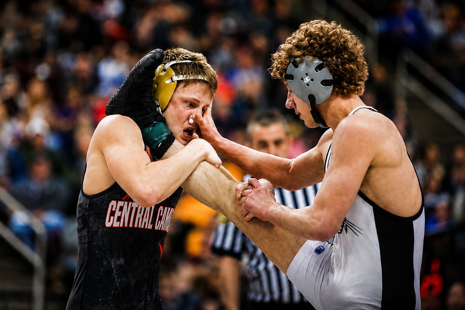 Wrestlers competing during a match